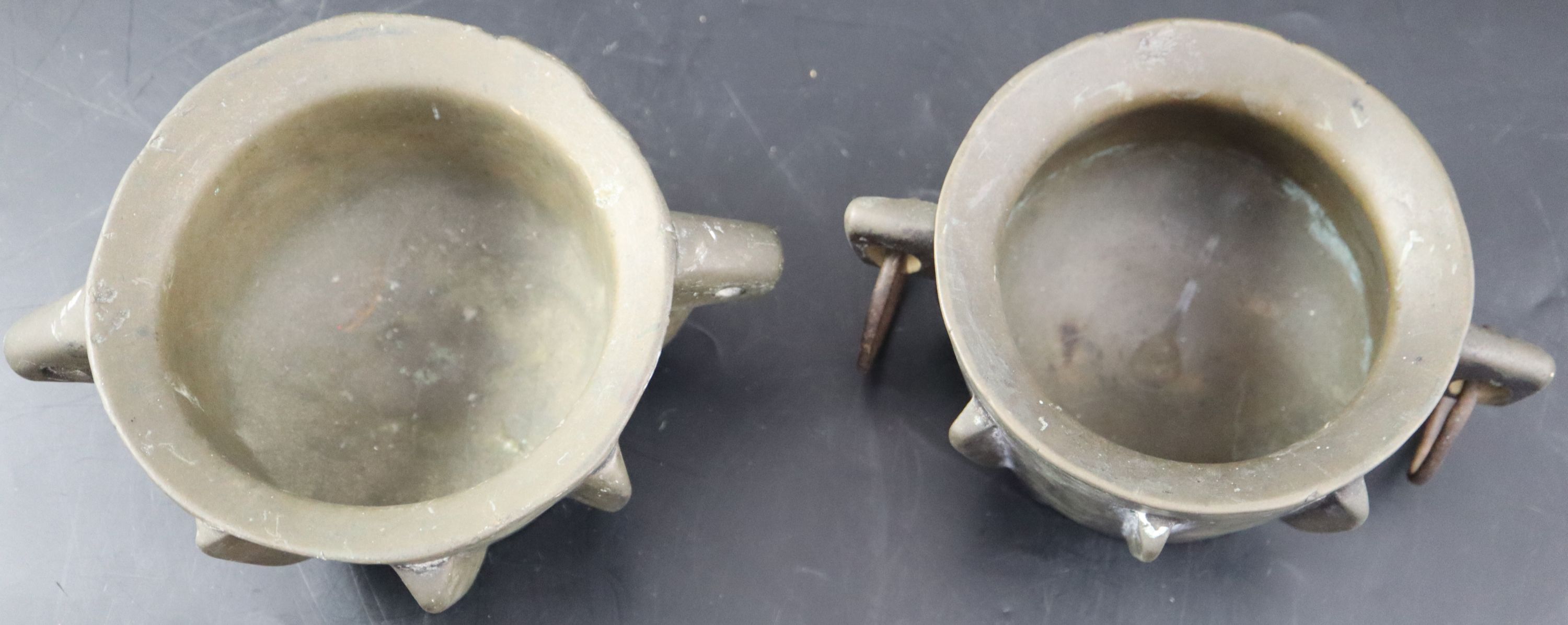 Two Spanish bronze mortars, height 8cm over handles 18cm